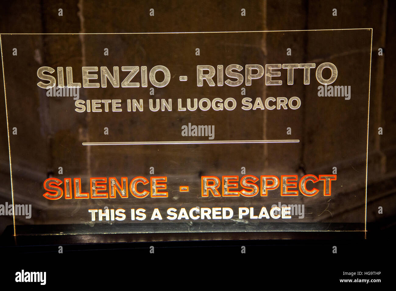 Sign requesting silence and respect in Santa Croce Basilica in Florence Italy Stock Photo