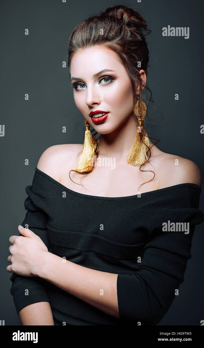 Beauty portrait with earrings hi-res stock photography and images - Alamy