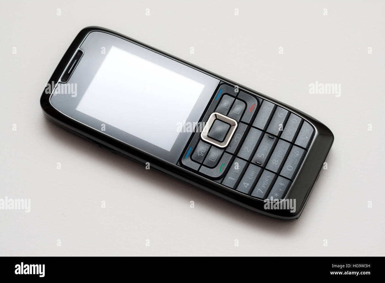Old mobile phone isolated on white background Stock Photo - Alamy
