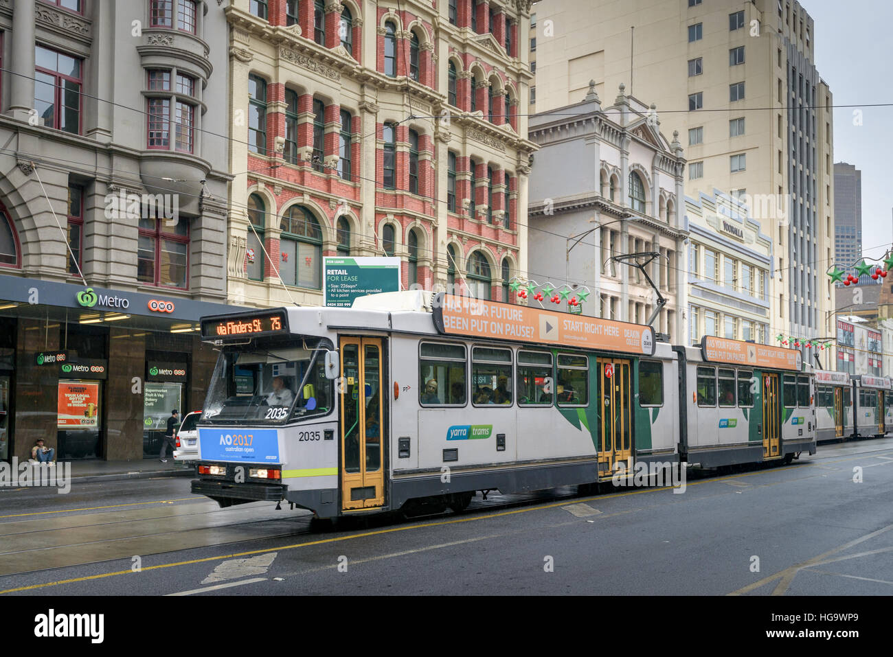 Melbourne, Australia - December 27, 2016: Melbourne City Tram at Flinders Street. The service is the most famous iconic transportation in the state. Stock Photo