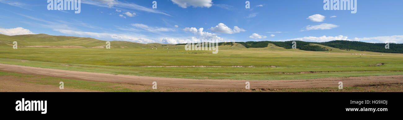 Panoramic view of the vast grassland can be commonly seen in summer time Mongolia. Stock Photo