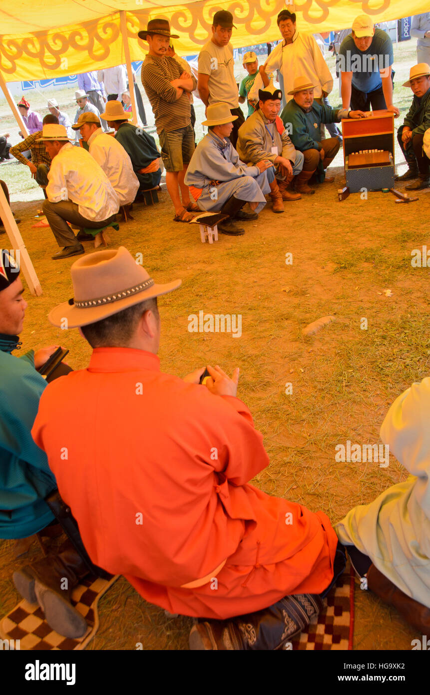 Knuckle-bone shooting game, Naadam Festival, Moron. Stock Photo