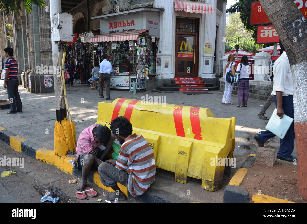 India Bombey Mumbai junkie on street Stock Photo
