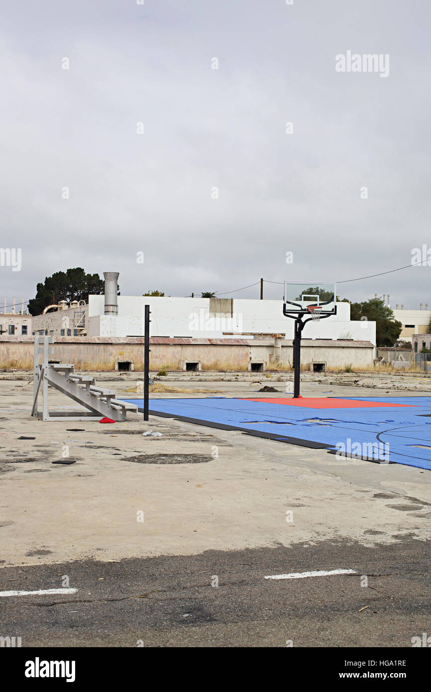 Abandoned basketball court in industrial area in Alameda, California