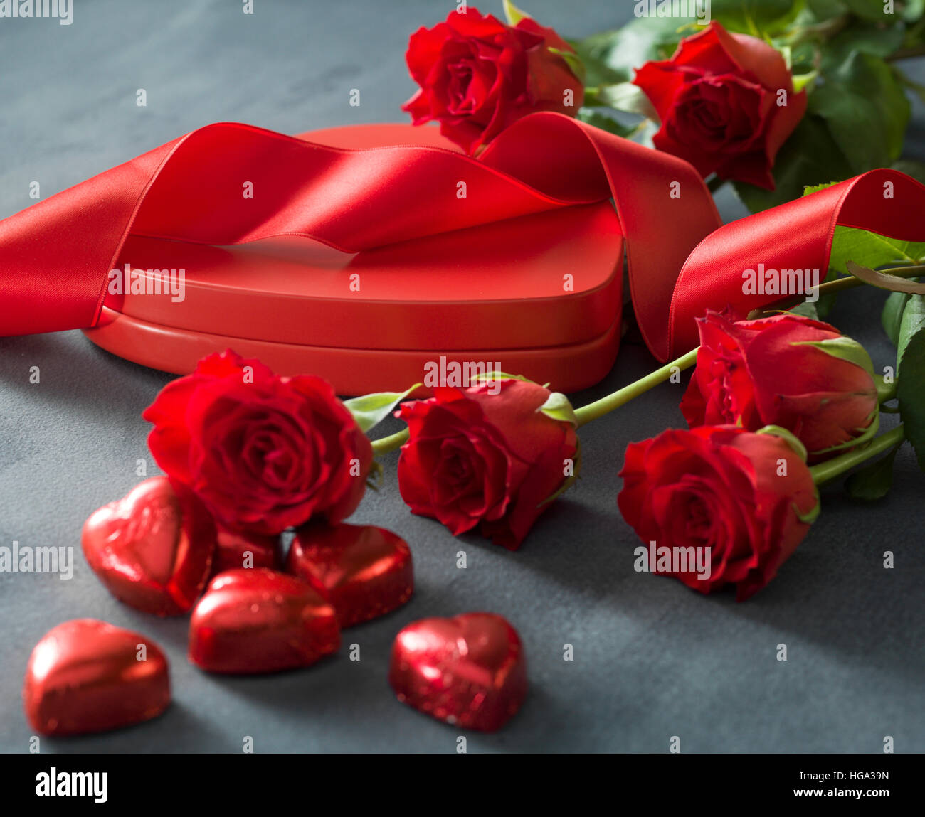 Heart shaped box with red hearts roses and ribbon. Valentines Day ...