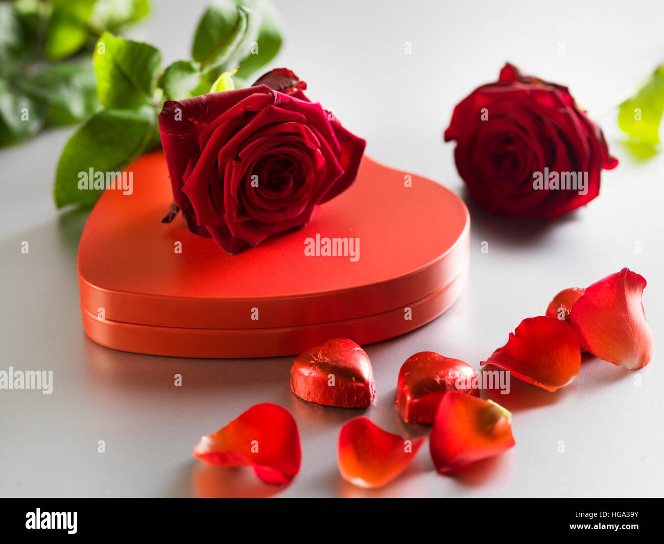 Red roses and box with red hearts on a white background. Valentines Day ...