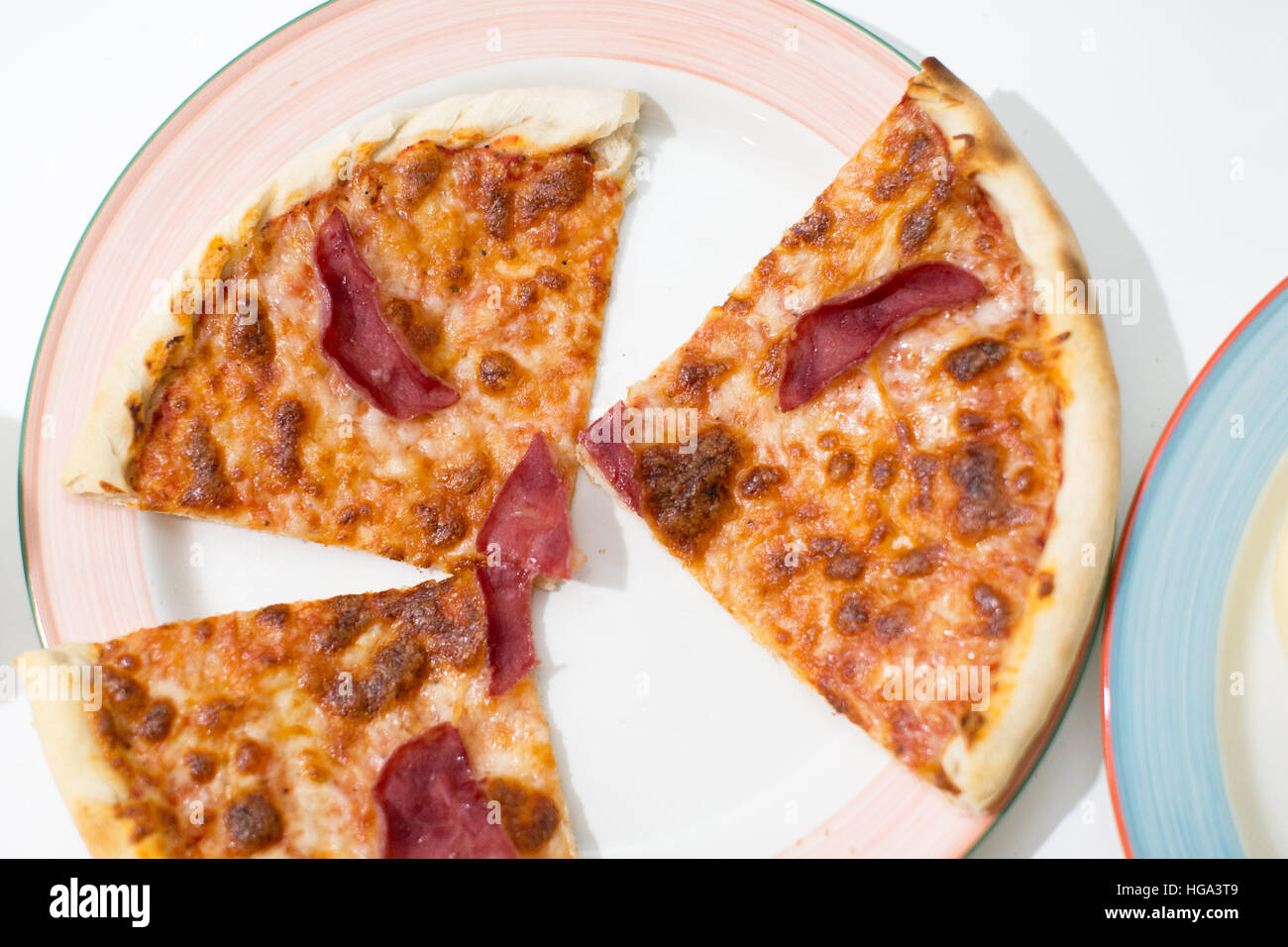 pizza party on pink plate. child birthday party. Stock Photo