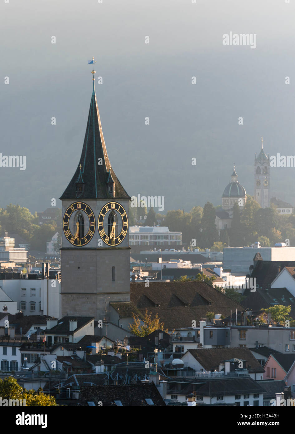 Clock tower of Zurich's St. Peter church and church Enge (also called