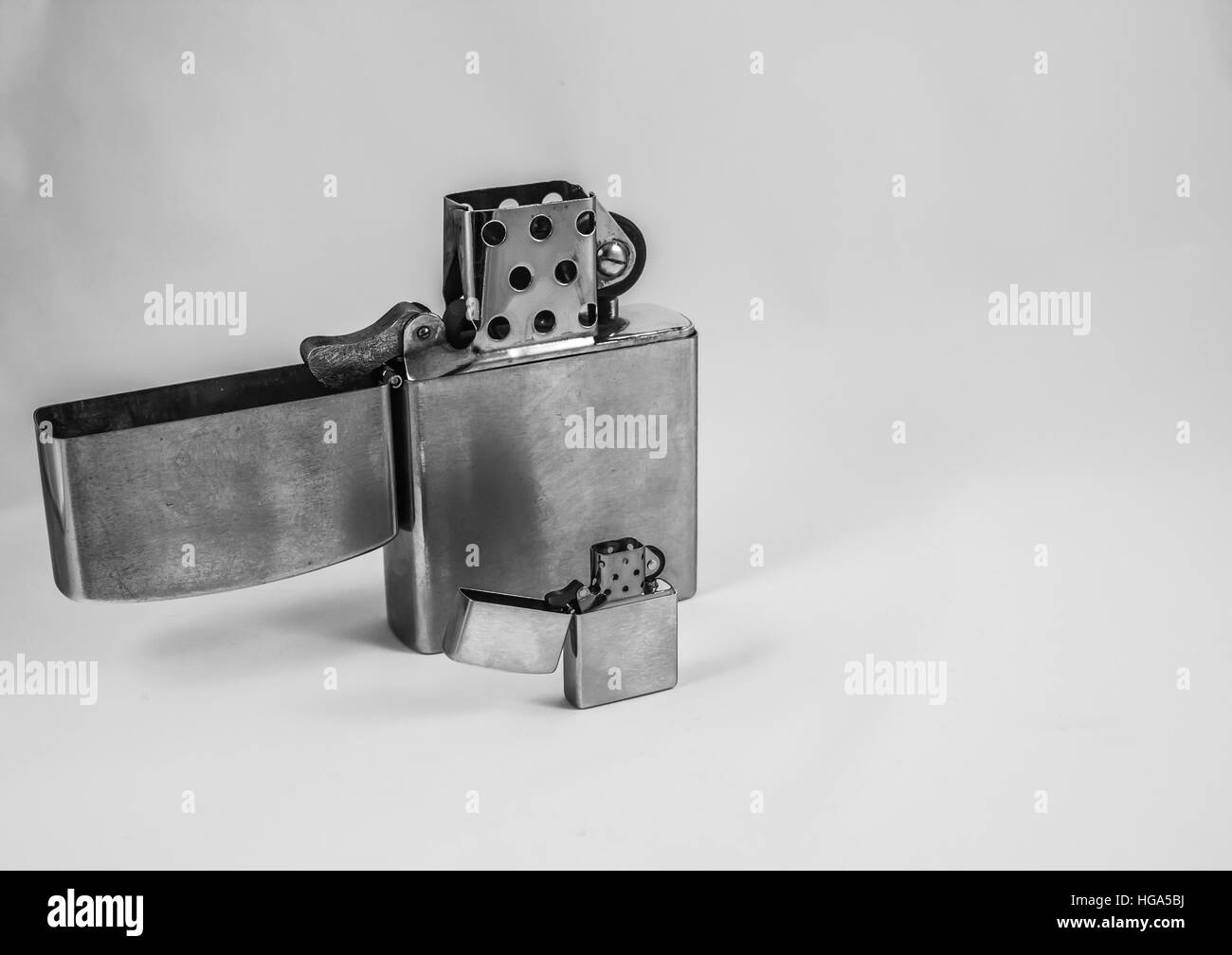 Two Flip Top Chrome Lighters Side By Side Stock Photo Alamy