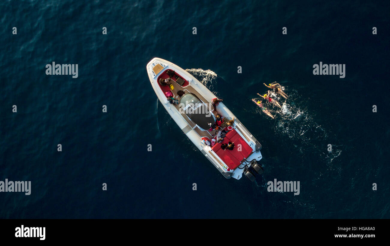 An Aerial View Of A Motorboat In The Mediterranean Sea With Three Lady ...
