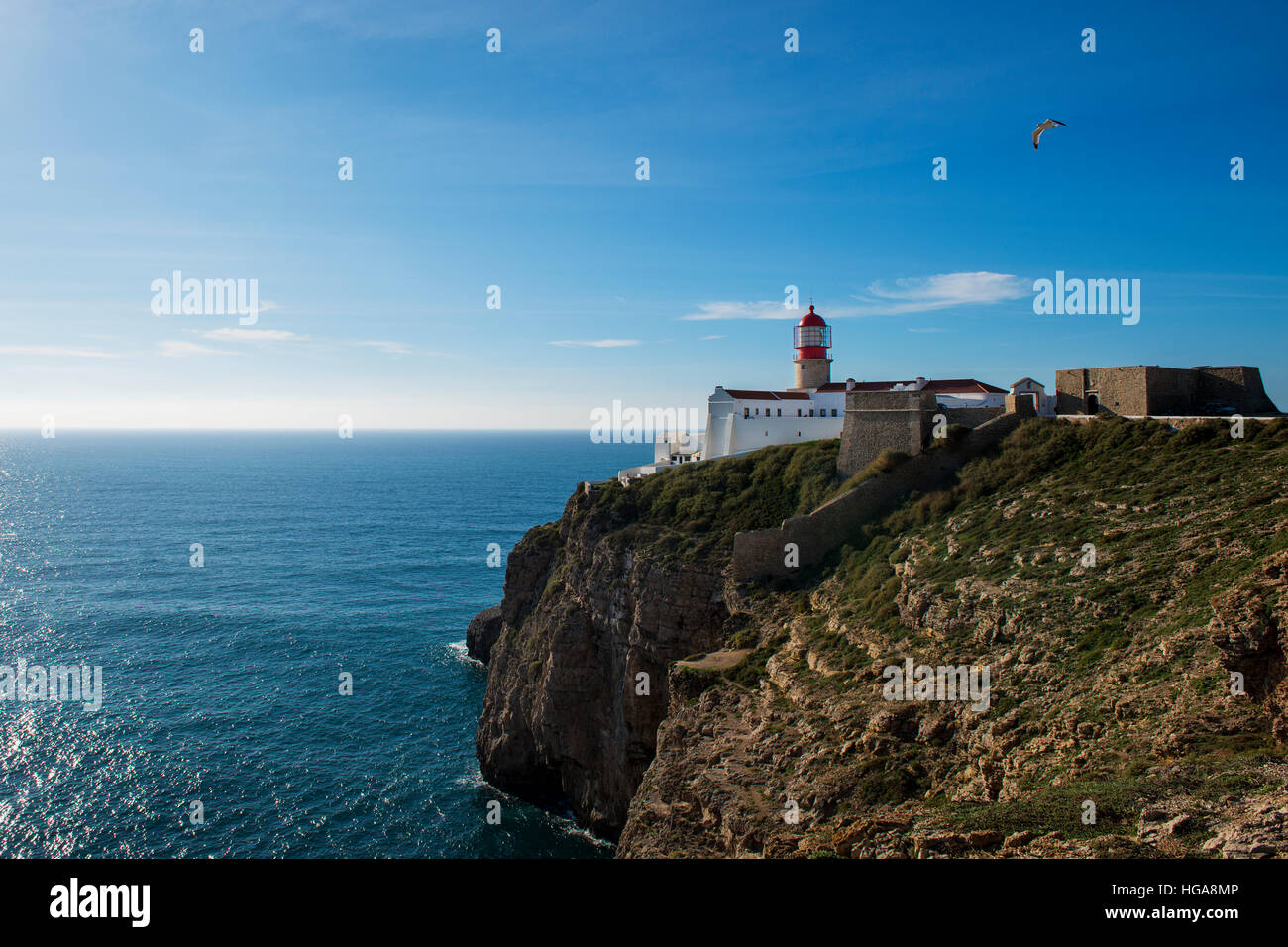 View of the Lighthouse at the Saint Vincent Cape (Cabo de Sao Vincente) in Sagres, Algarve, Portugal; Concept for travel in Portugal Stock Photo