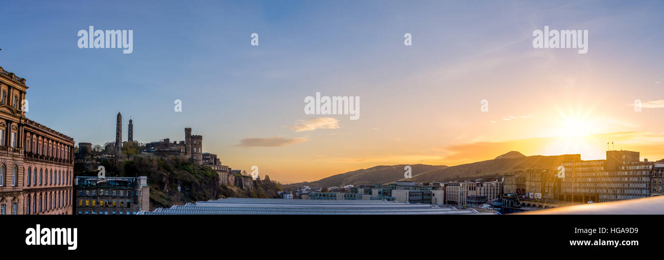 Edinburgh cityscape and skyline as seen from North Bridge during sunrise. Panoramic view Stock Photo