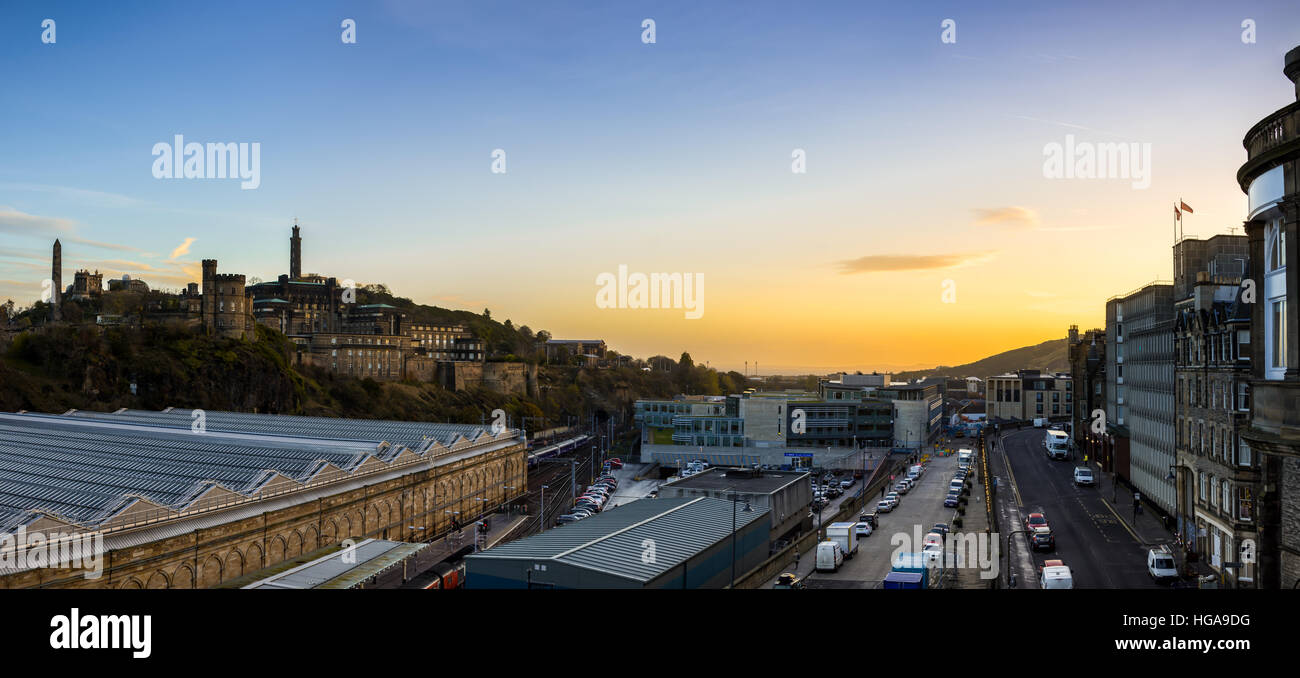 Edinburgh cityscape and skyline as seen from North Bridge during sunrise. Panoramic view Stock Photo