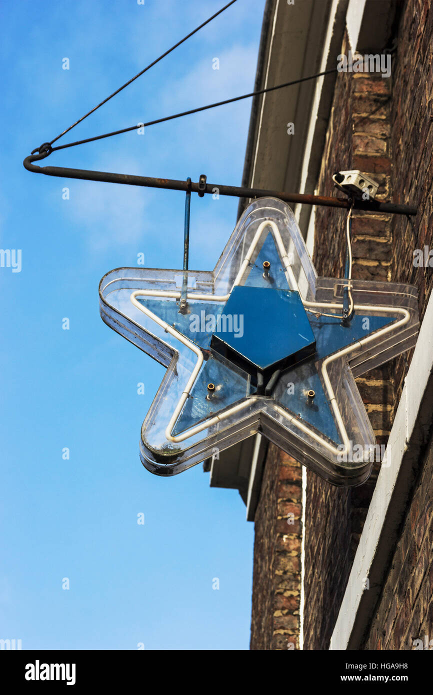 Blue Star logo of Scottish and Newcastle Breweries above a Newcastle public house. Stock Photo