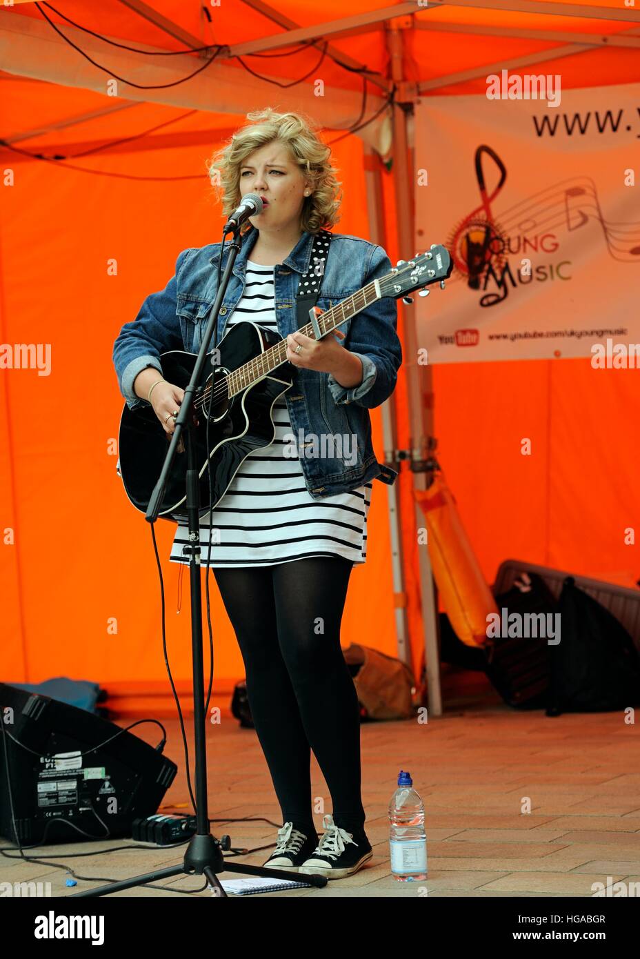 Young female singer on stage at Tramlines Fringe Festival, the Moor Sheffield 2014 Stock Photo
