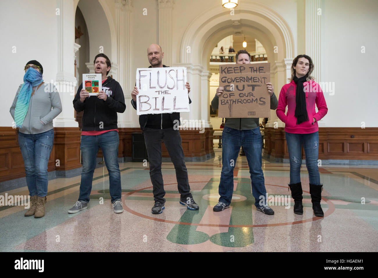Protesters yell in the hallway as Texas Sen. Lois Kolkhorst, (R-Brenham) and Lt. Gov. Dan Patrick outline the filing of Senate Bill 6 a privacy protection measure known as the 'bathroom bill'. The bill would require transgender Texans to use their birth gender in determining bathroom use Stock Photo
