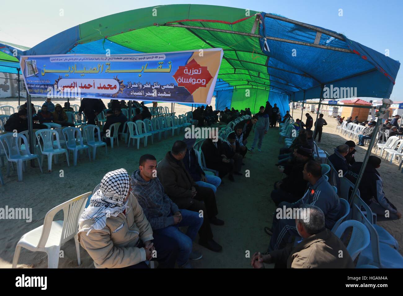 Gaza City, Gaza Strip, Palestinian Territory. 7th Jan, 2017. Palestinians attend an absentee funeral prayer of the fisherman Muhammad al-Hissi who went missing Wednesday after an encounter with Israeli forces, was announced dead on Friday, in Gaza city, on January 7, 2017. Gazan fishermen, whose numbers are estimated to be around 4,000, have suffered from a near decade-long siege of the Gaza Strip, which limits fishermen to just six nautical miles into the sea in accordance with the ceasefire agreement signed with Palestinian factions in 2014 (Credit Image: © Mohammed Asad/APA Images via Stock Photo