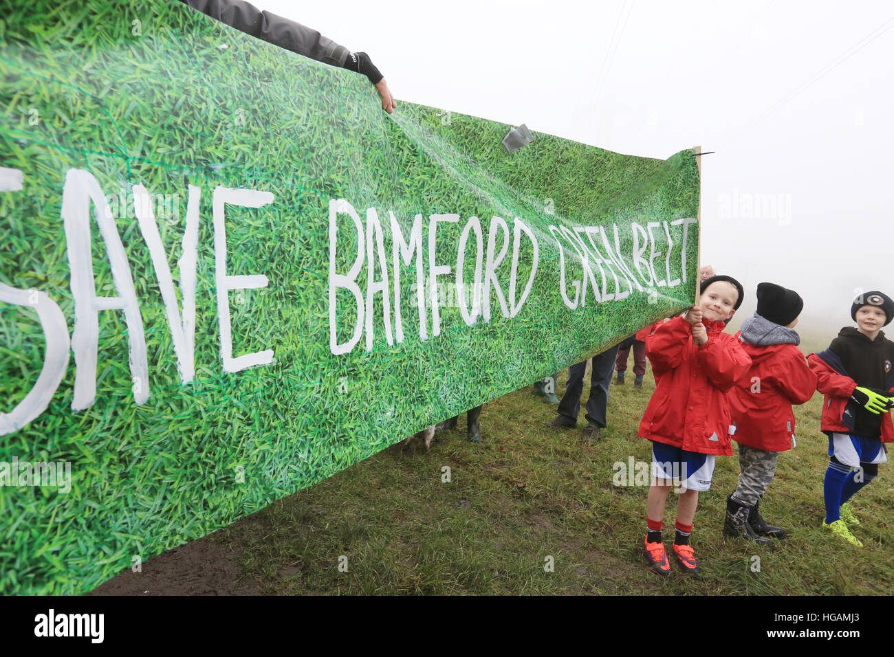 Rochdale, Lancashire, UK. 7th January, 2017. A youngster holding a banner which reads 'Save Bamford green Belt', Bamford, Rochdale, 7th January, 2017  © Barbara Cook/Alamy Live News Stock Photo