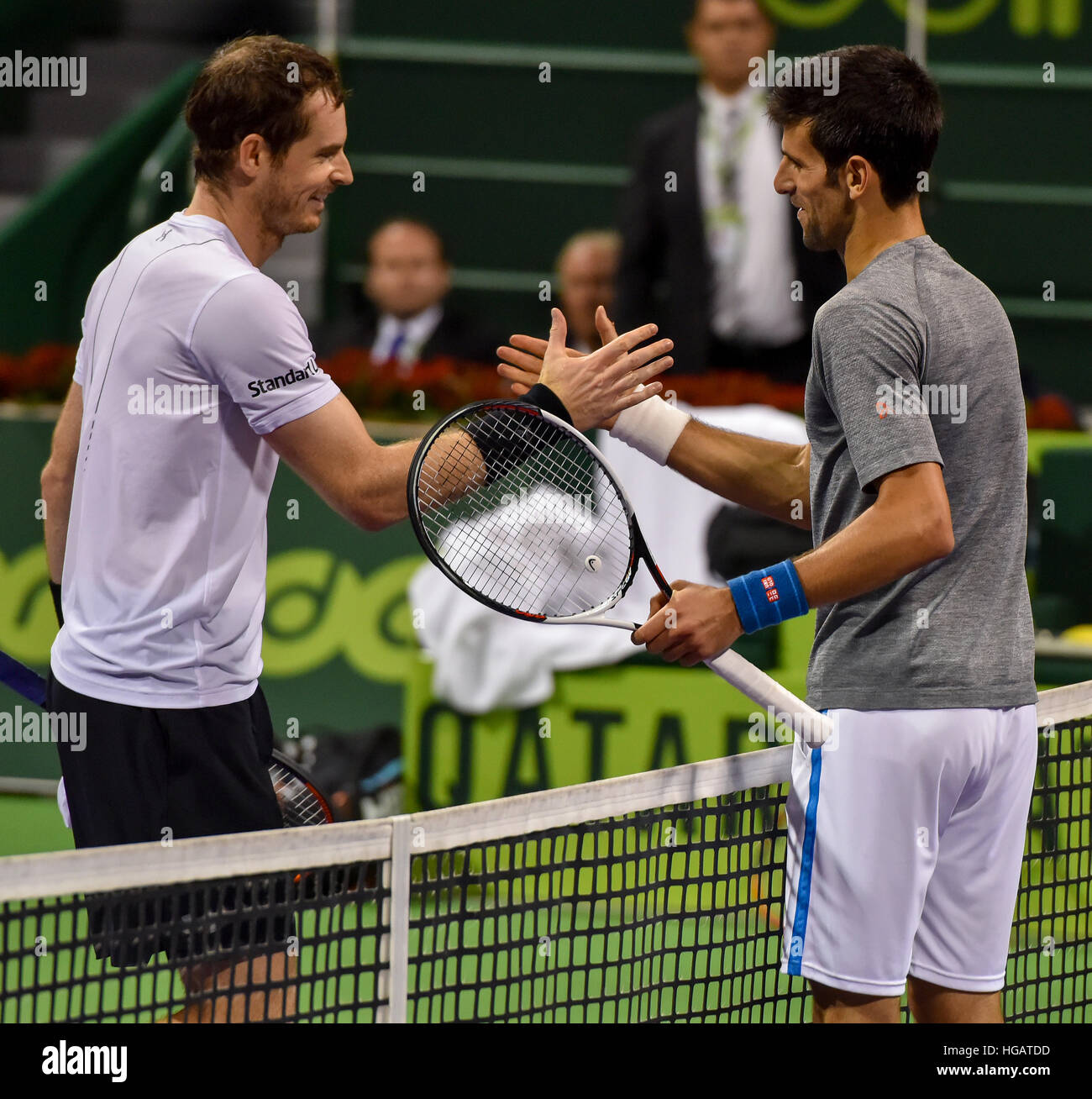 Doha, Qatar. 7th Jan, 2017. Novak Djokovic (R) of Serbia shakes hands Stock  Photo - Alamy