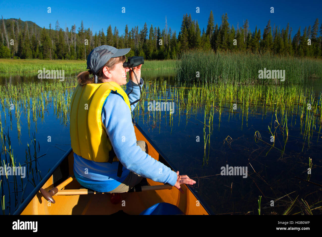 Canoeing on Lava Lake, Cascade Lakes National Scenic Byway, Deschutes