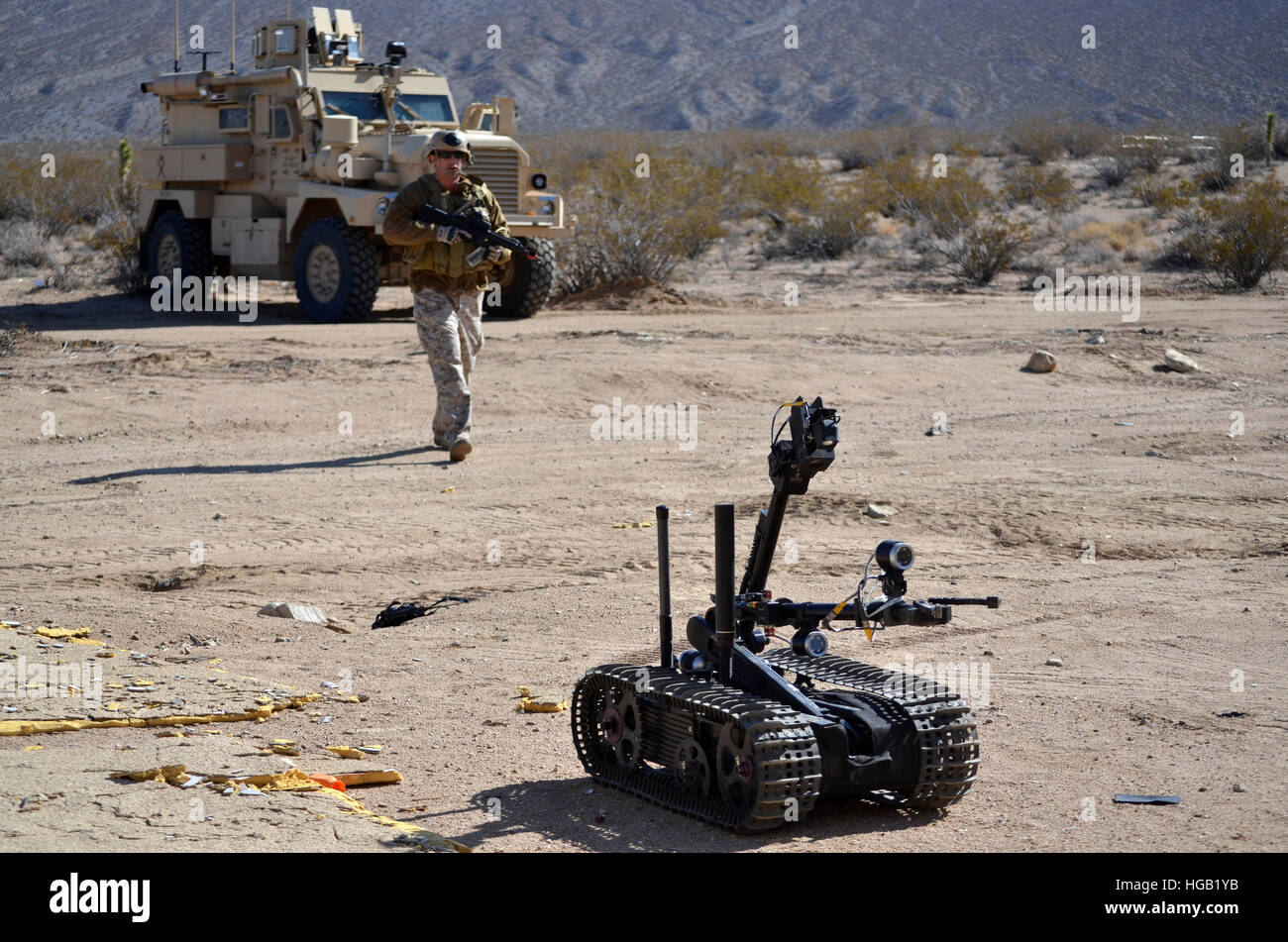 Explosive ordnance disposal technician using a Talon Mark 2 robot. Stock Photo