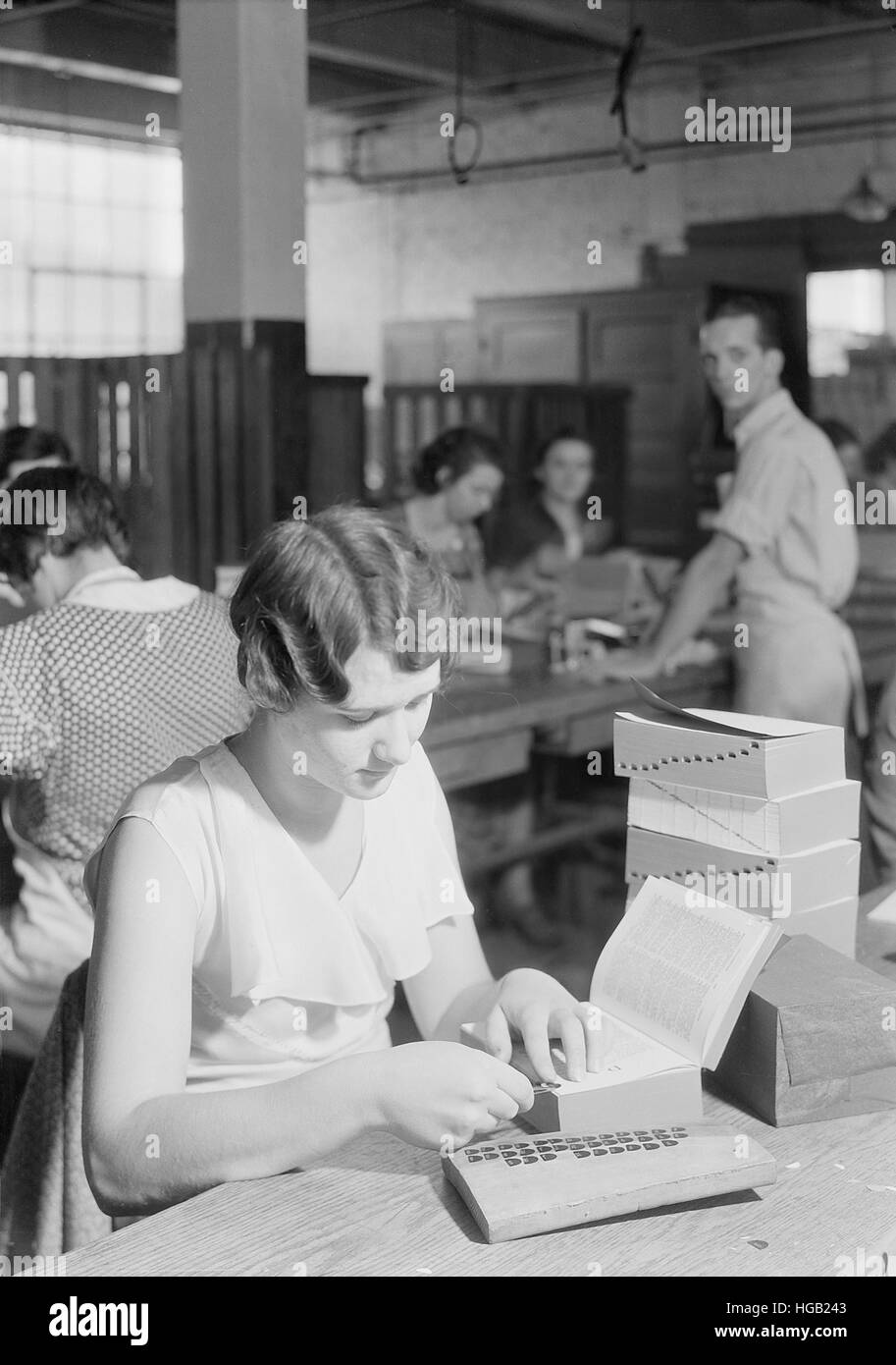 Woman placing index tabs at Kingsport Press, Tennessee, 1933. Stock Photo