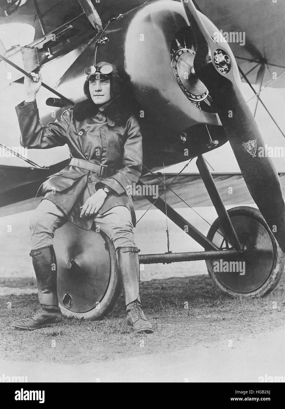 Lieutenant Earl Carroll seated on the wheel of his fast scout airplane. Stock Photo