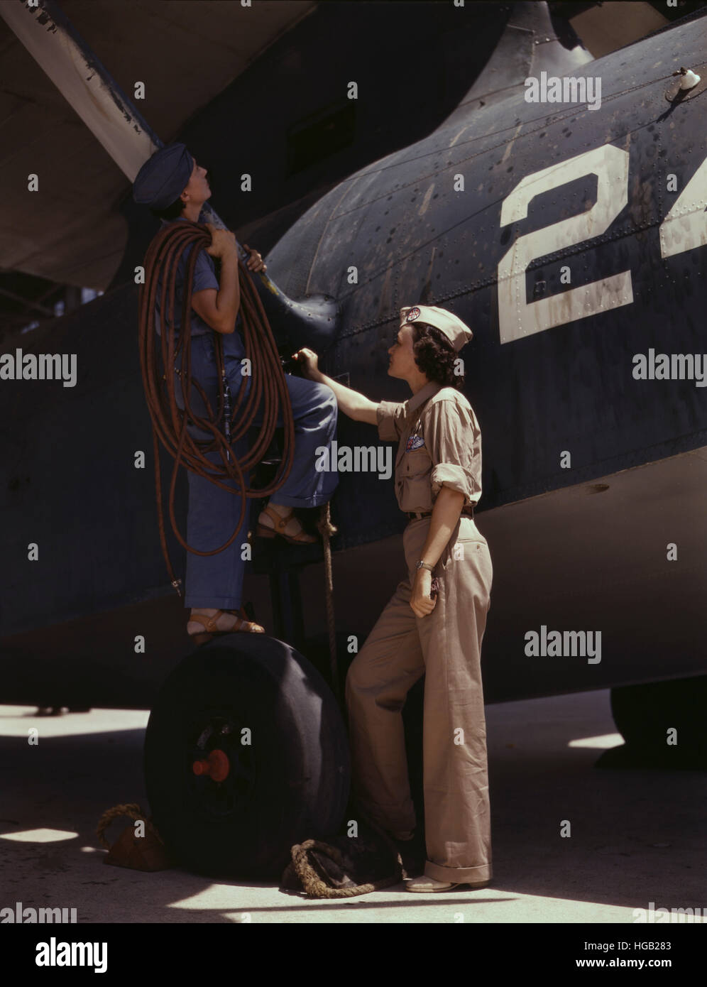 Women working on U.S. Navy planes at the Naval Air Base in Corpus Christi, Texas. Stock Photo
