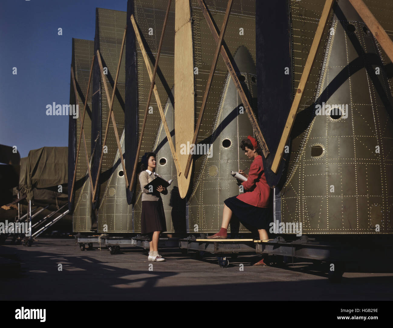 Women check and inspect cargo transport inner wings. Stock Photo