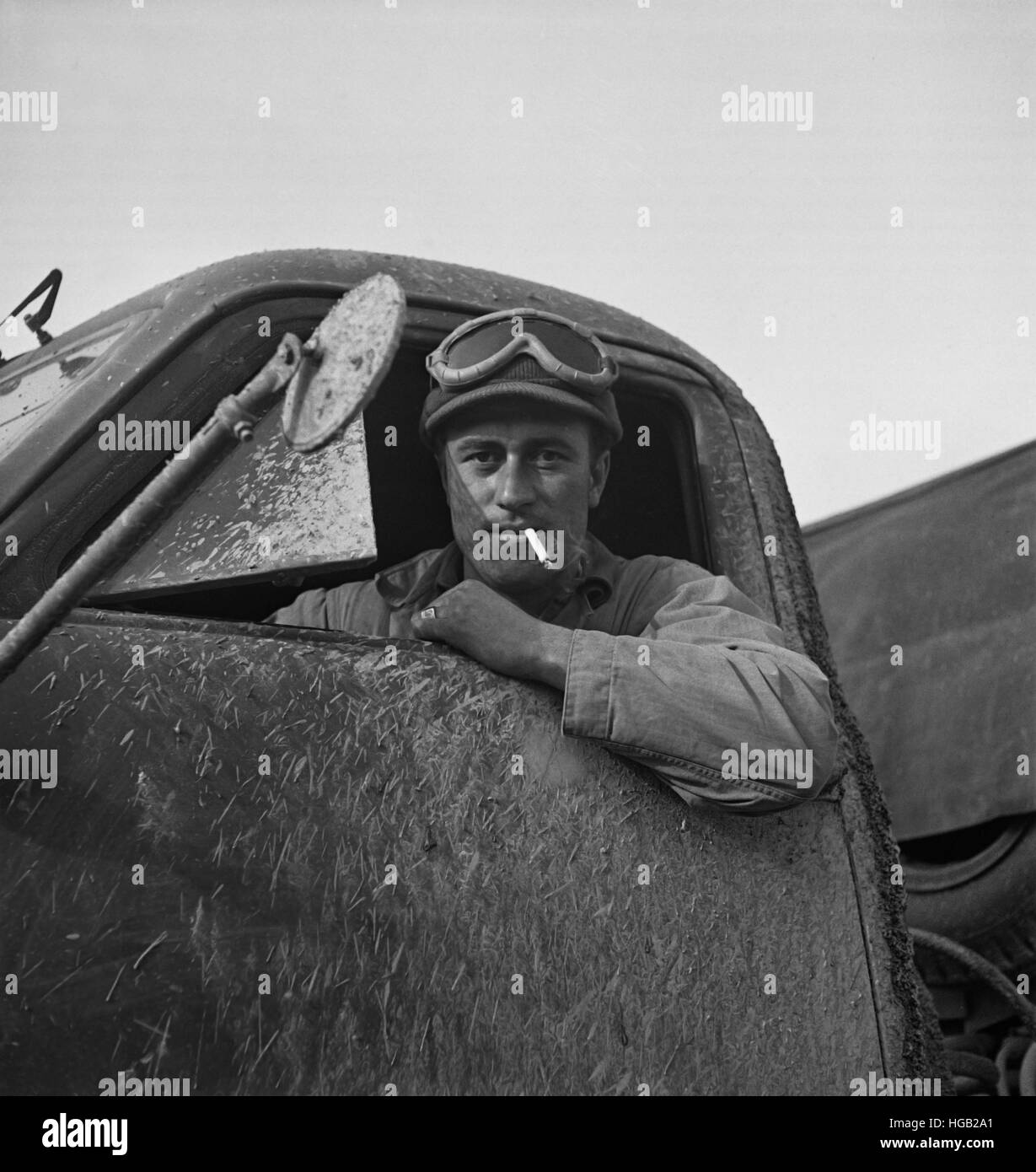 Private First Class serving as a truck driver with the United States Army overseas, 1943. Stock Photo