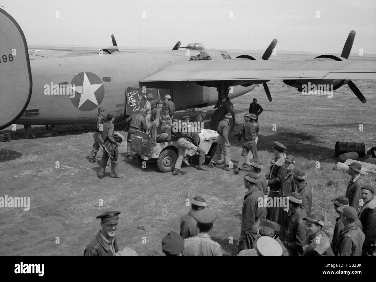Bomber crews of the U.S. Army 9th Air Force are being given a chalk talk before a mission, 1943. Stock Photo