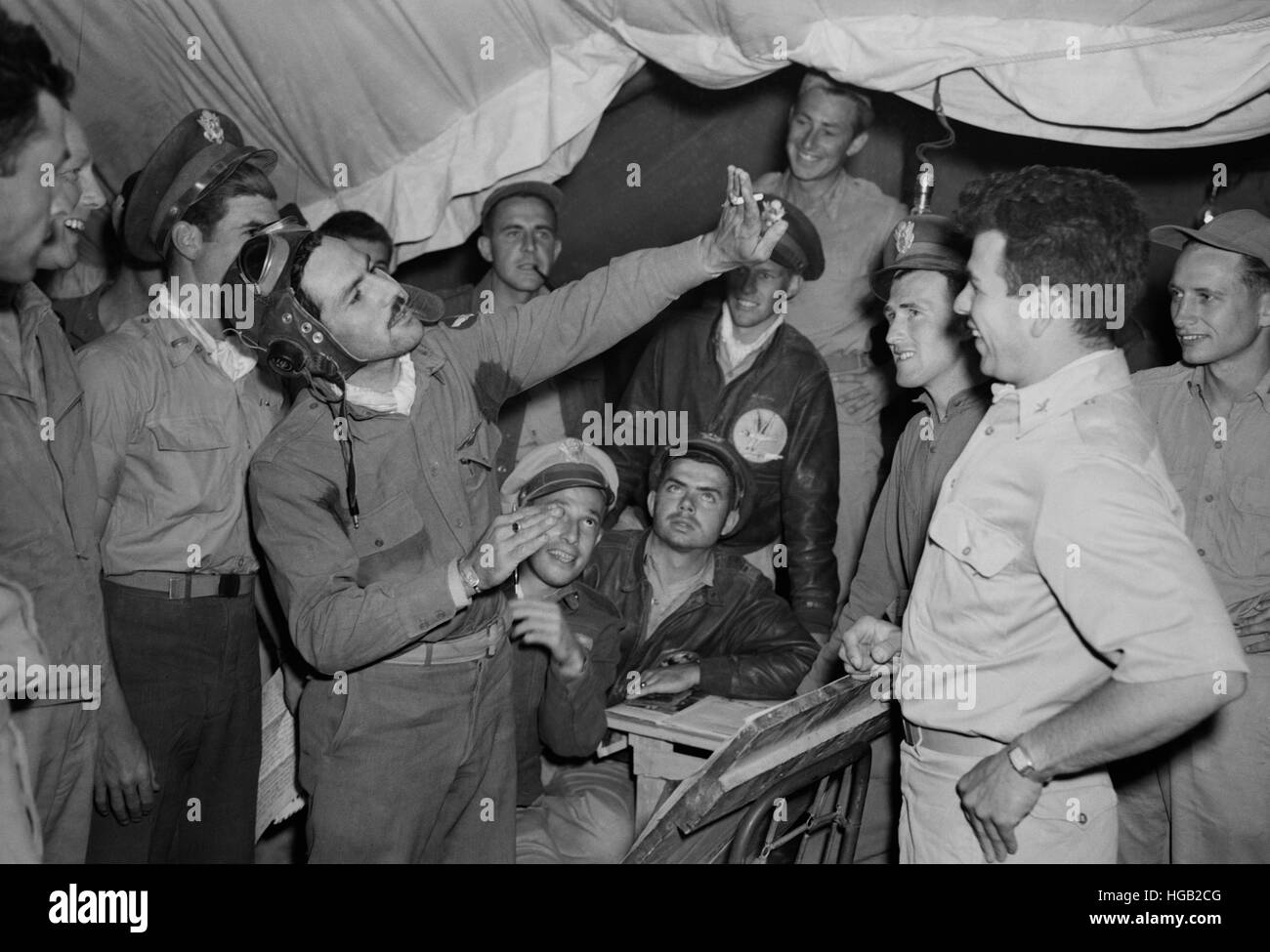Men of the 314th squadron telling events from a recent World War II air battle, 1943. Stock Photo
