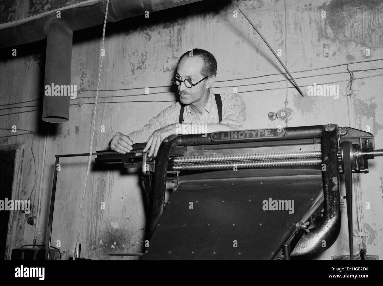 Getting out the newspaper published by and for Sicilians, 1943. Stock Photo