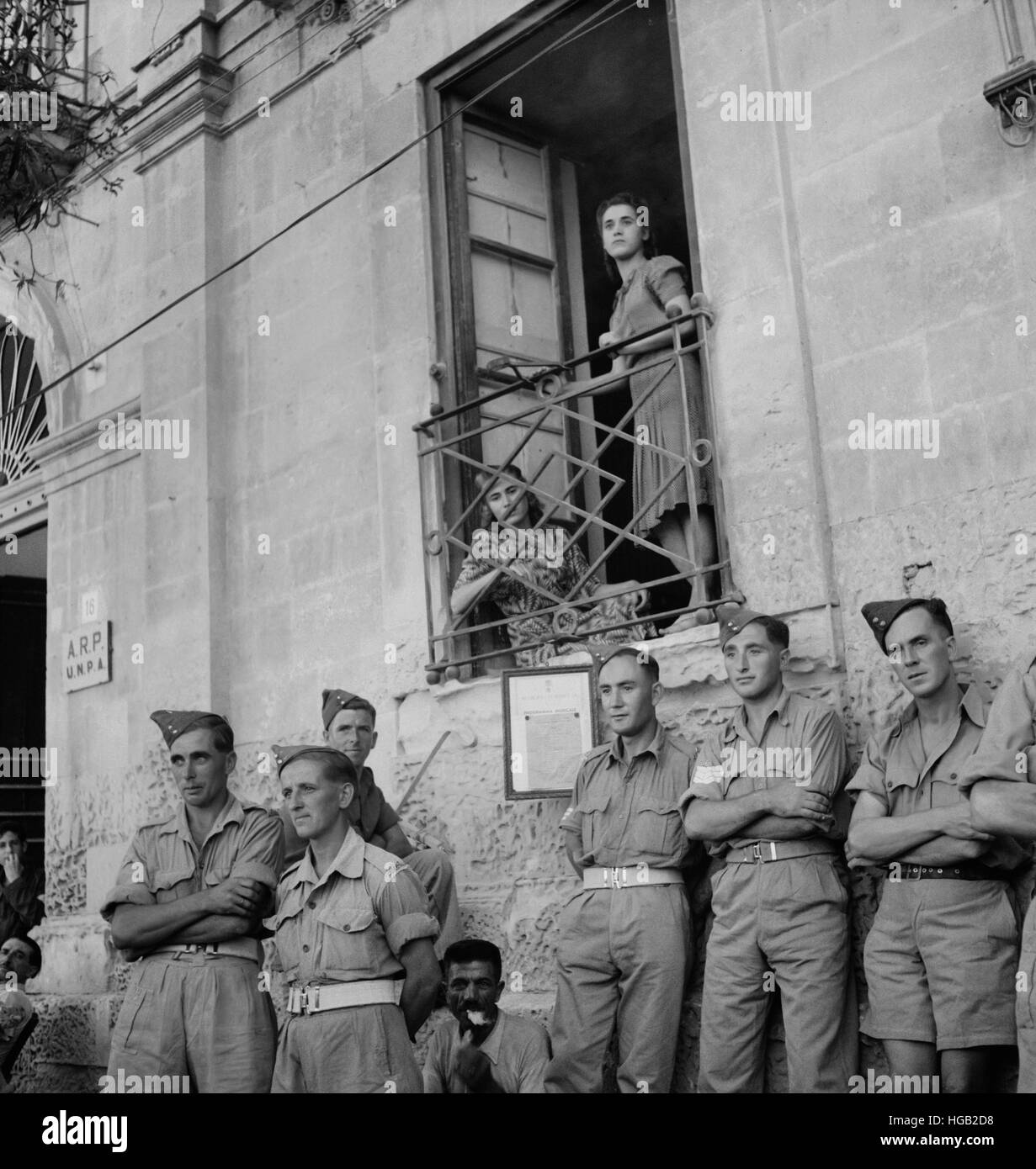 French-Canadian soldiers in Sicily with French speaking Italians, 1943. Stock Photo