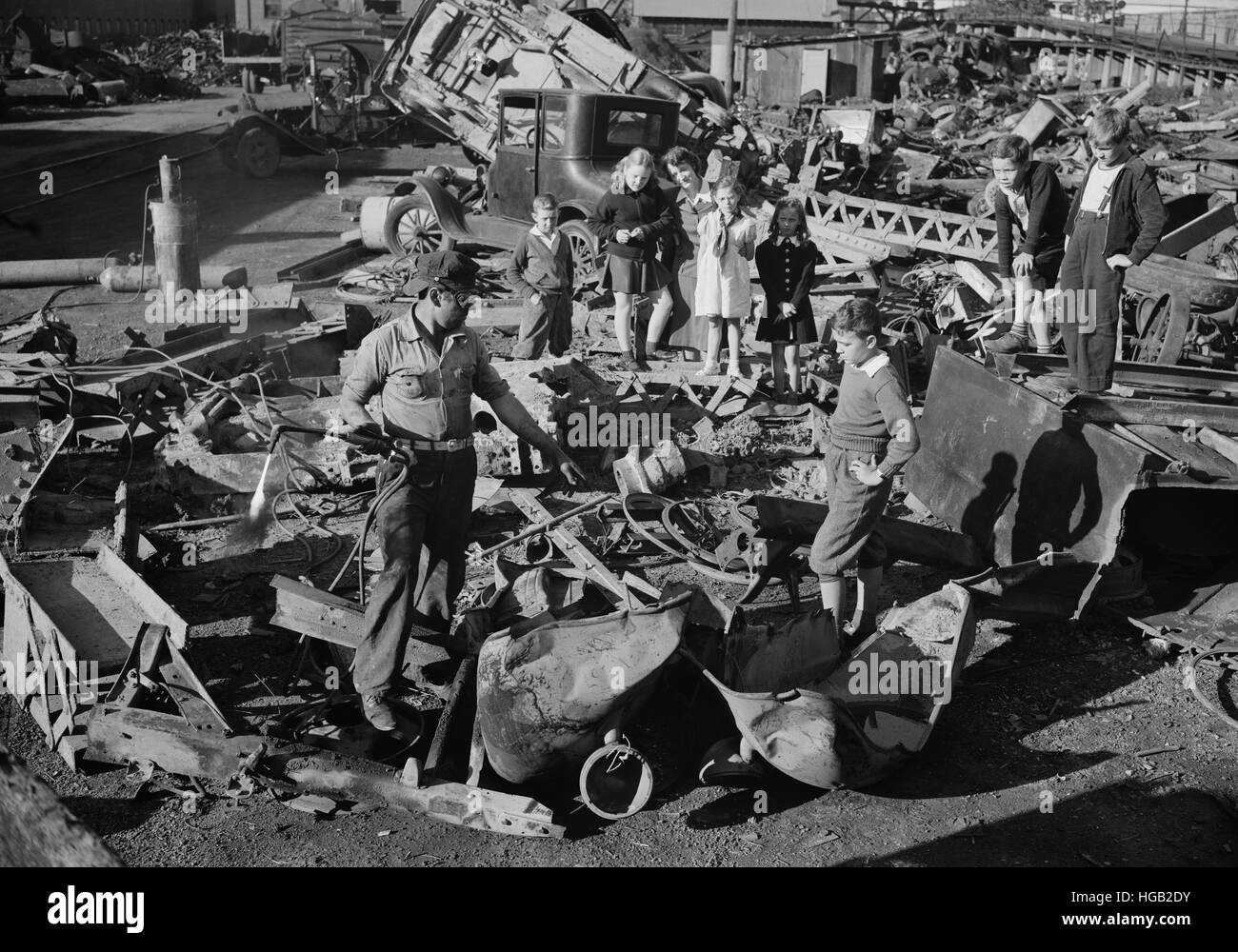 Young fighters in Uncle Sam's junior army visit a scrap yard in Roanoke, Virginia, 1942. Stock Photo