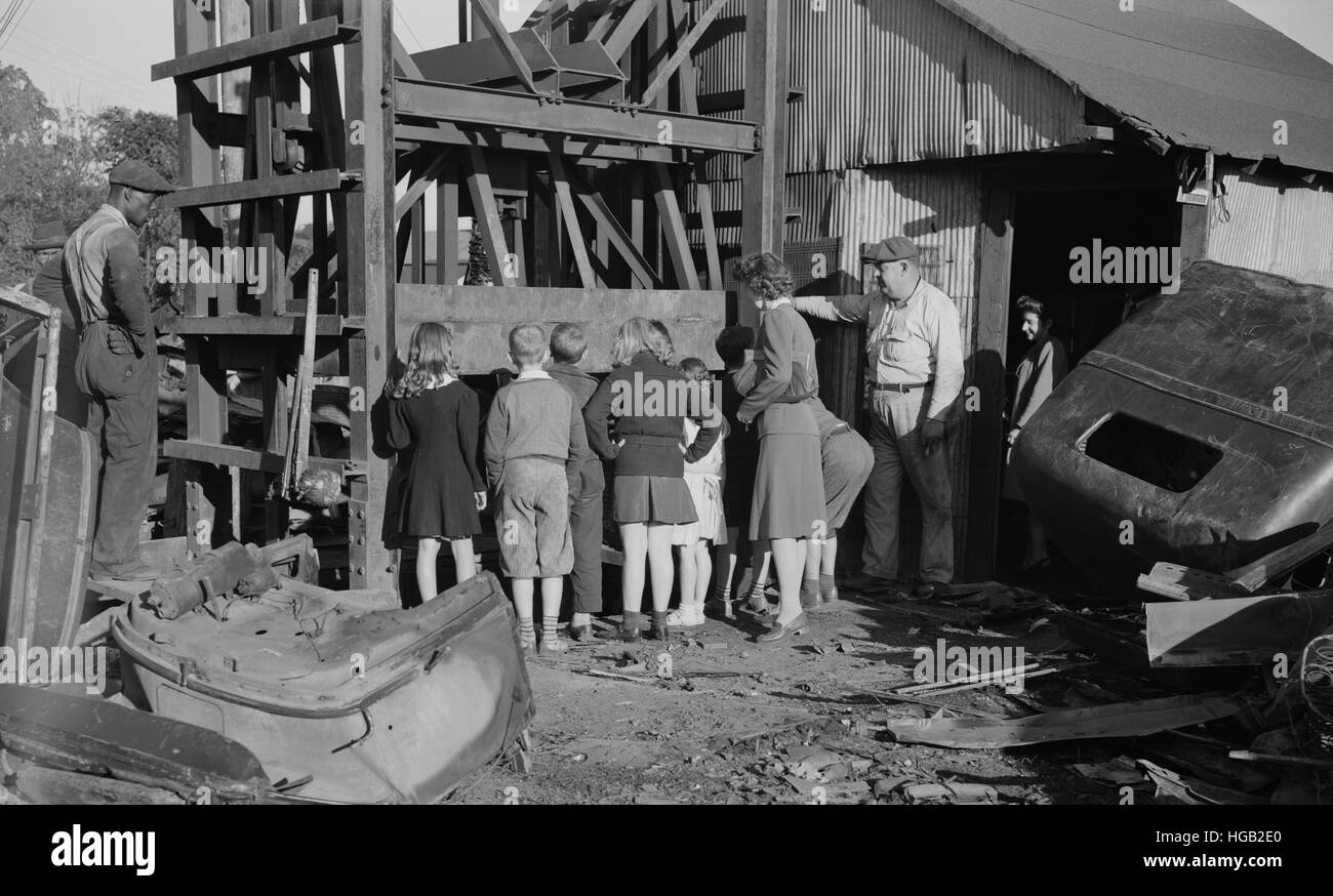 Young fighters pay a visit to a scrapyard in Roanoke, Virginia, 1942. Stock Photo