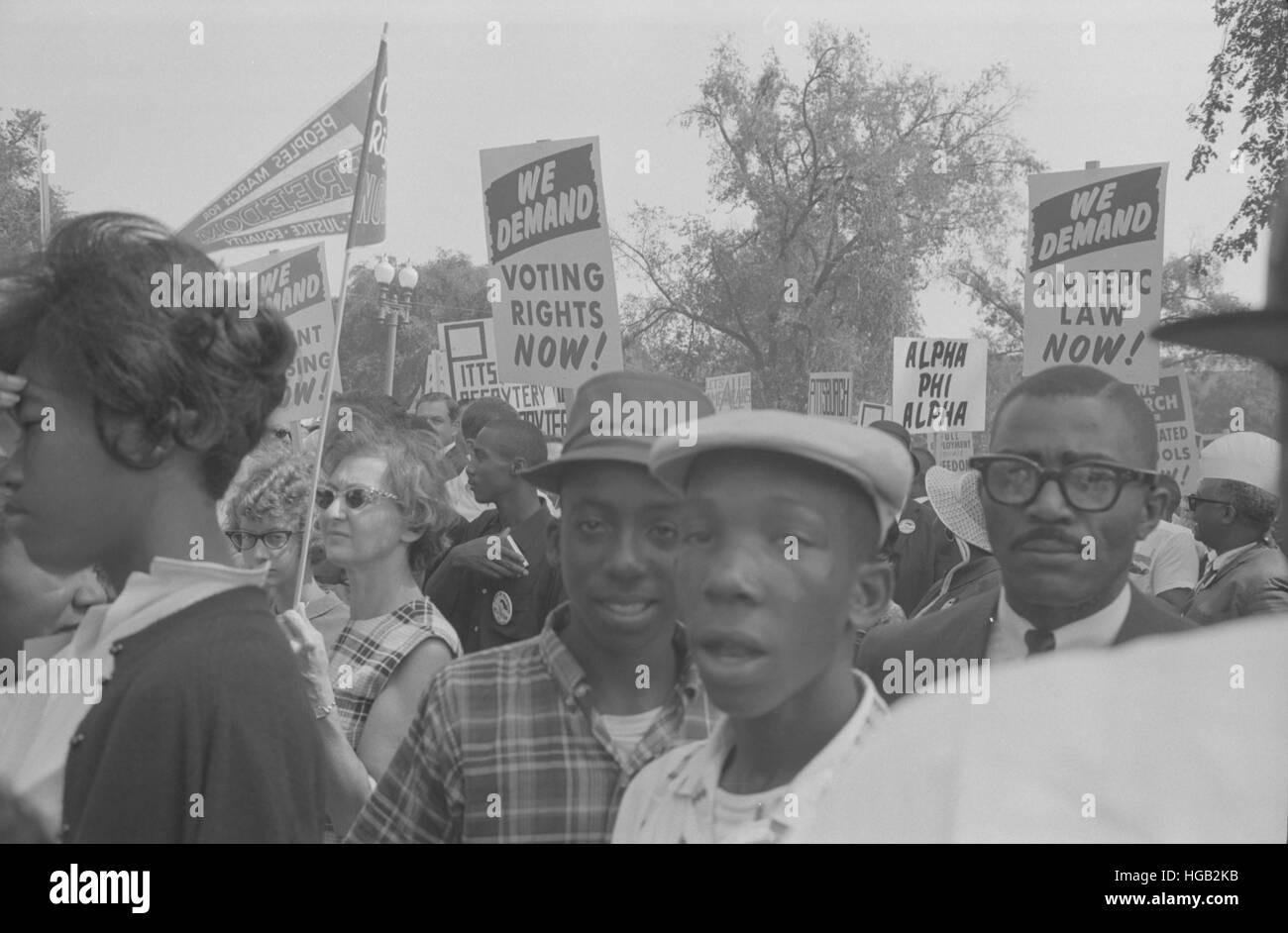 Demonstrators holding signs during the March on Washington, 1963. Stock Photo