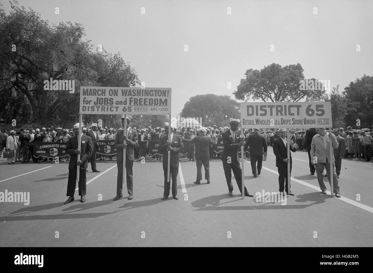 August 28, 1963 - Marchers carrying District 65 sign at the March on Washington. Stock Photo