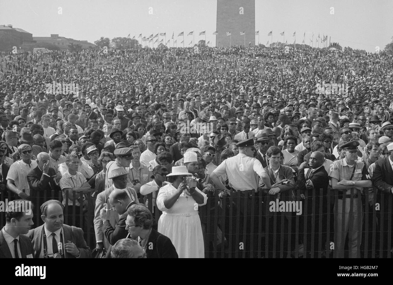 August 28, 1963 - Woman with a camera and crowd at the March on Washington. Stock Photo