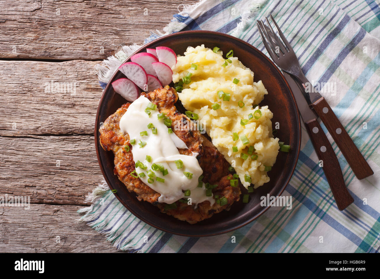 American food Country Fried Steak and White Gravy on a plate