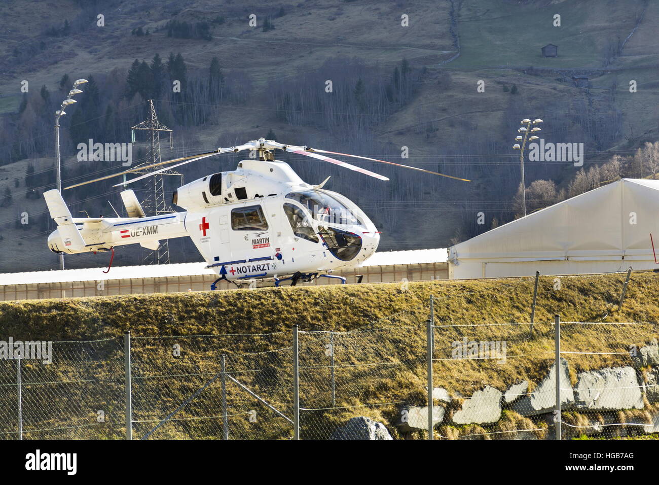 Red Cross medic MD Helicopter MD Explorer by McDonnell Douglas Helicopter Systems stands on heliport in Matrei, Austria Stock Photo