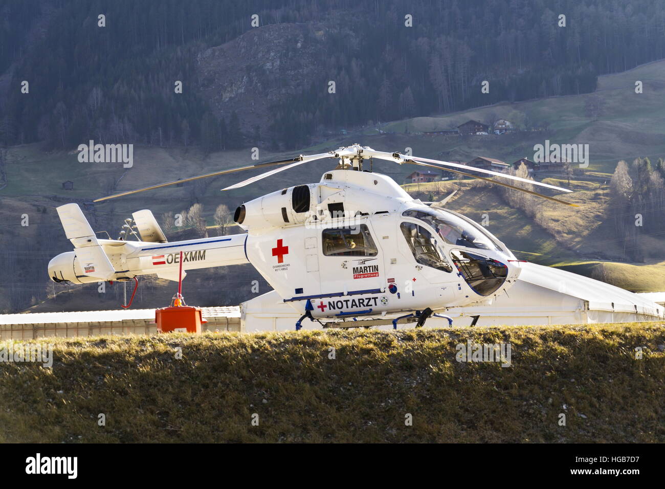 Red Cross medic MD Helicopter MD Explorer by McDonnell Douglas Helicopter Systems stands on heliport in Matrei, Austria Stock Photo