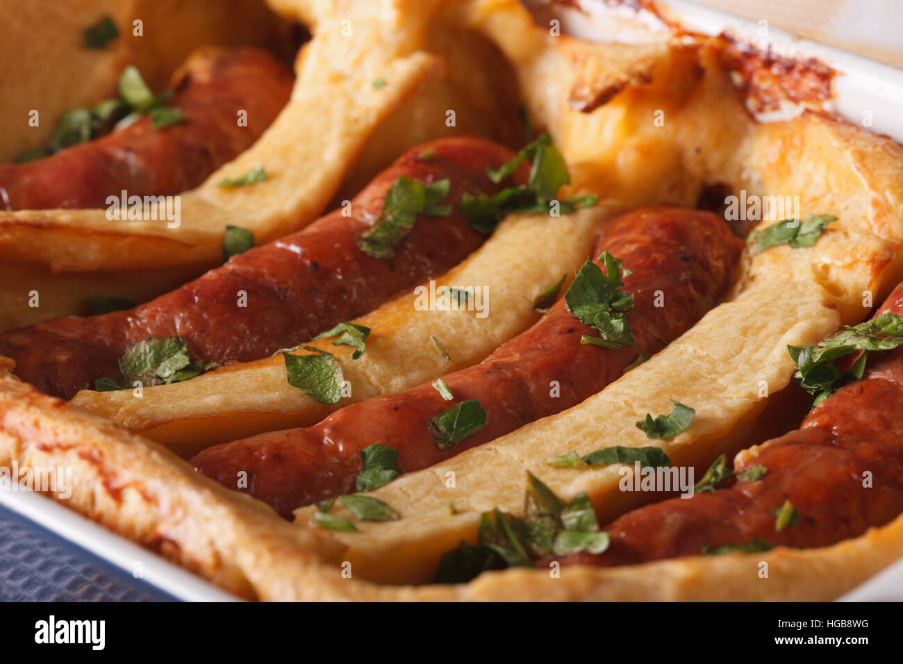 Traditional English dish toad in the hole macro horizontal Stock Photo Alamy