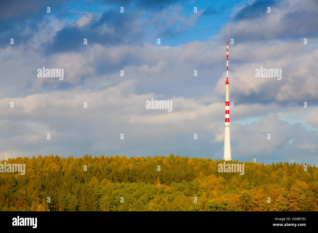 TV transmission tower in the autumn forest Stock Photo Alamy