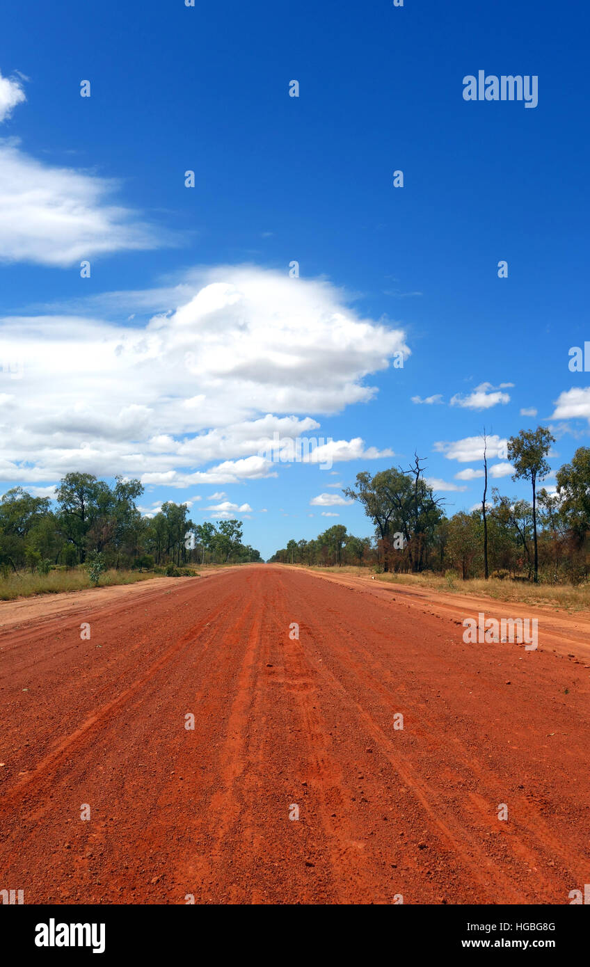 Straight, corrugated red dirt outback road, north of Barcaldine, Queensland, Australia Stock Photo