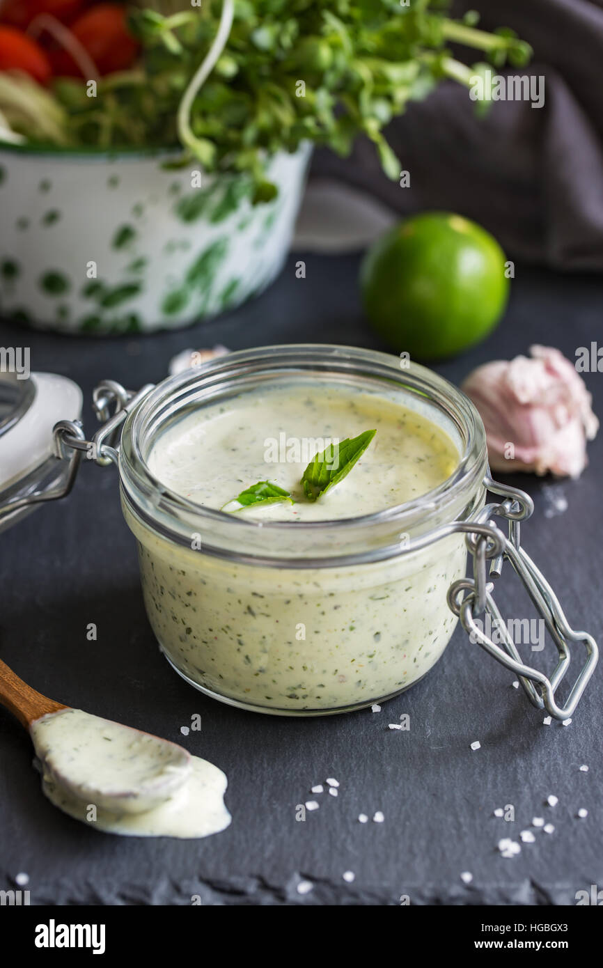 Basil yogurt dressing by fresh ingredients Stock Photo Alamy