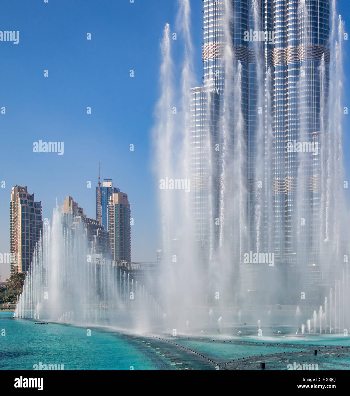 The Dubai Fountain The World Largest Choreographed Fountain On Burj Khalifa Lake Performs To The Beat Of The Selected Music At Sunset On Background Stock Photo Alamy