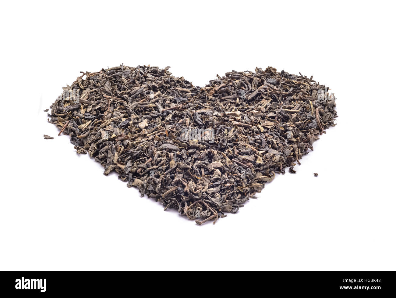 Heart shape black tea isolated on white Stock Photo Alamy