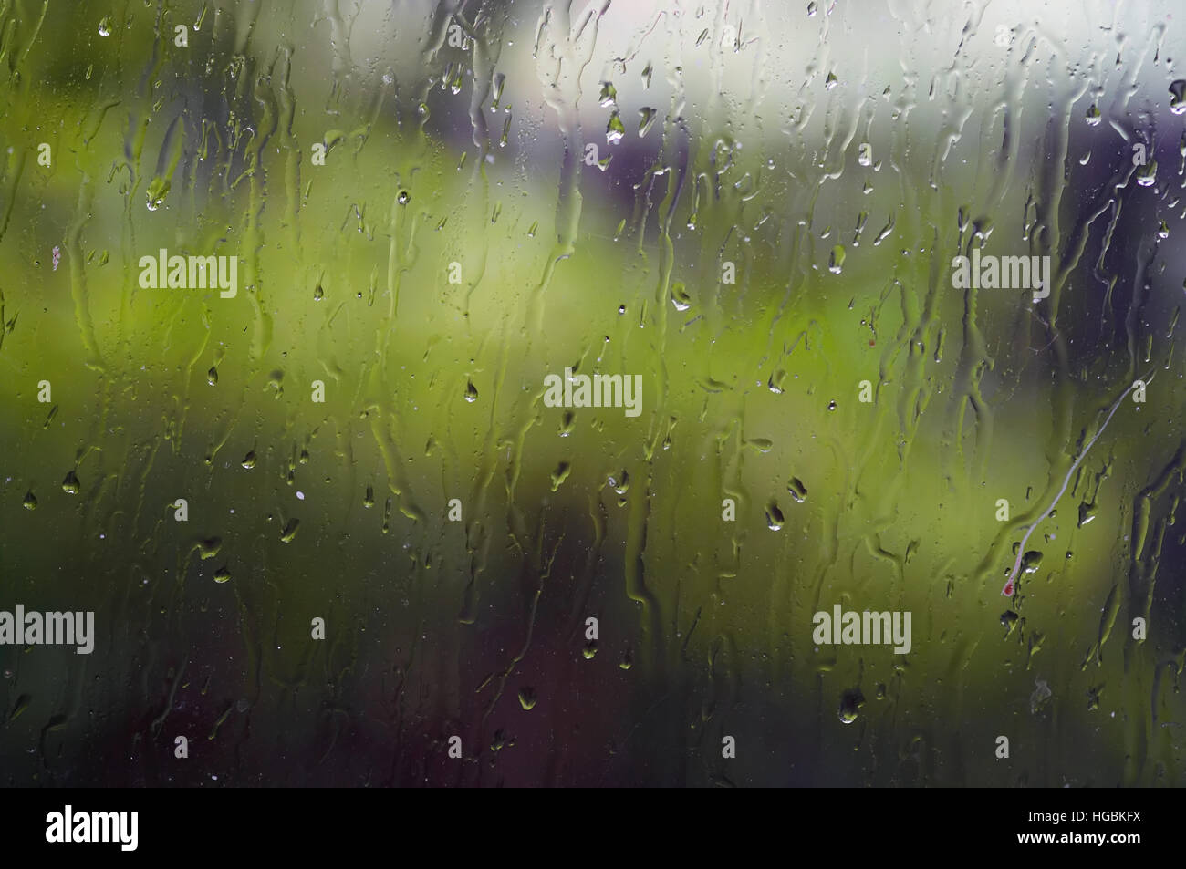 Water drops on window - splattered glass - abstract background Stock Photo