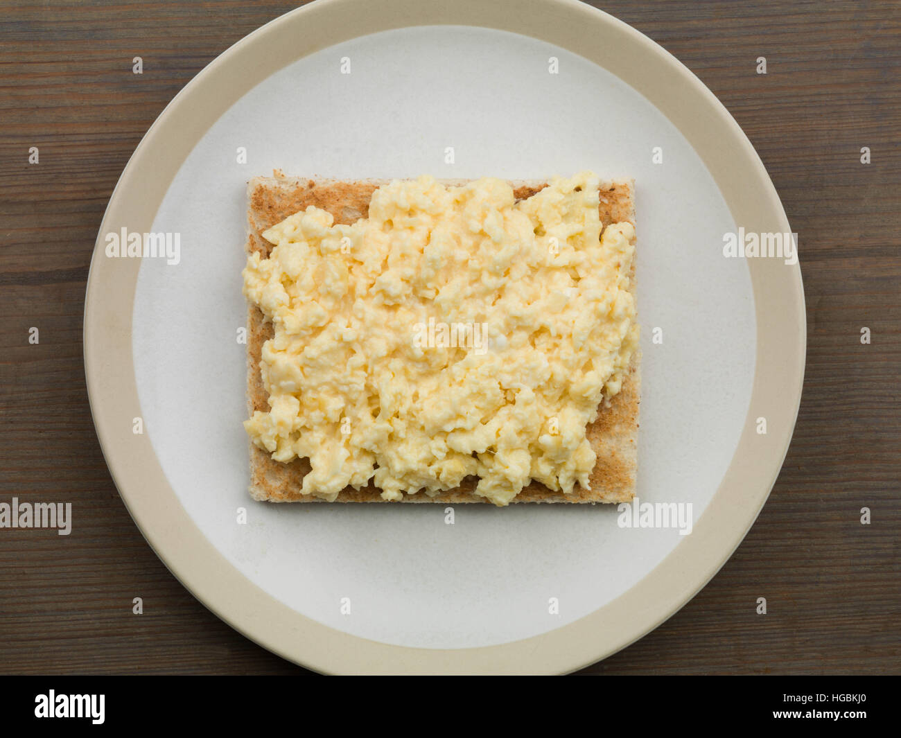 Healthy Calorie Controlled Cooked Breakfast Of Fresh Scrambled Eggs On Toast Meal Ready To Eat With No People And A Flat Lay Composition Stock Photo